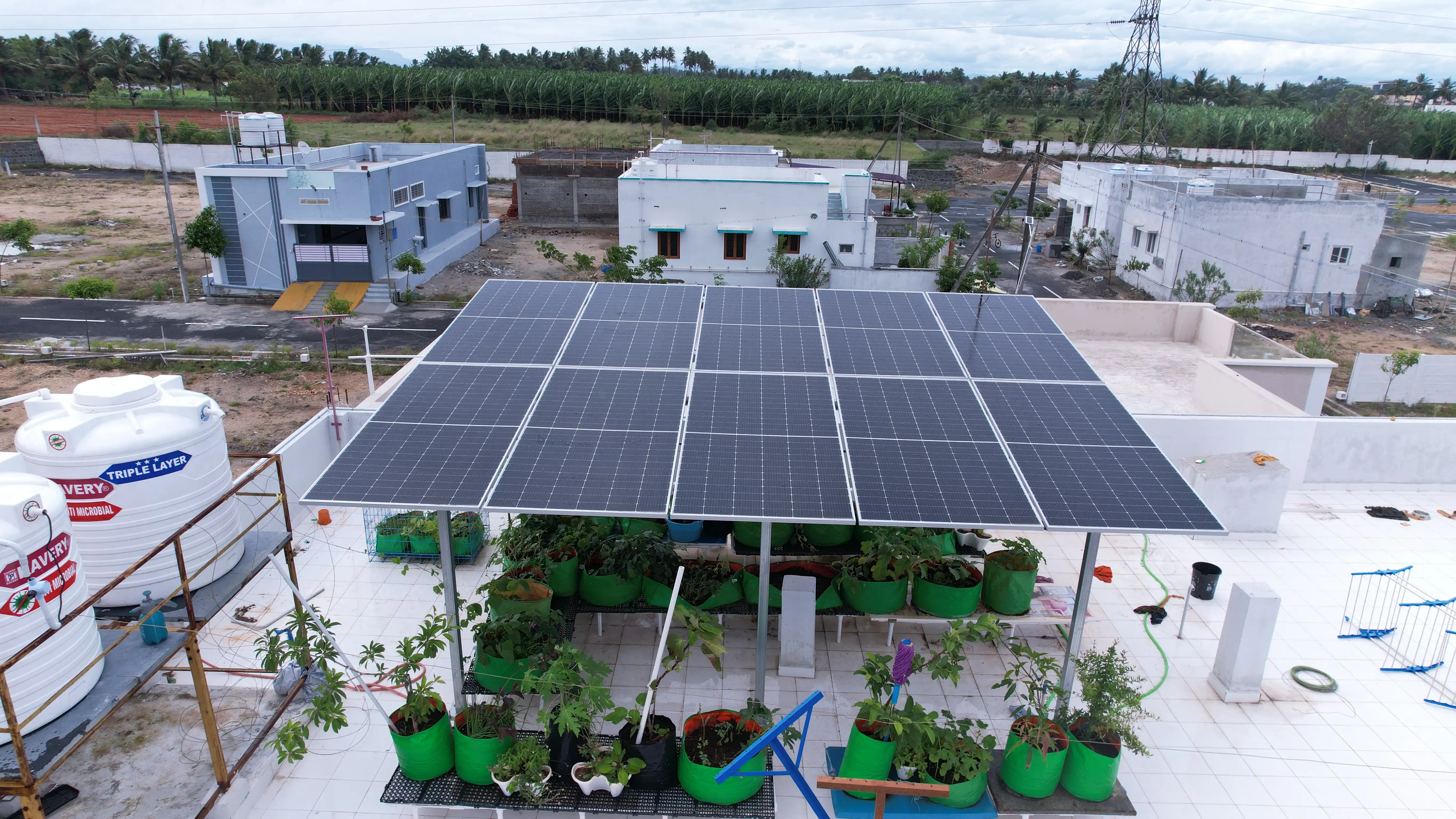 Aerial view of completed solar installation on residential property
